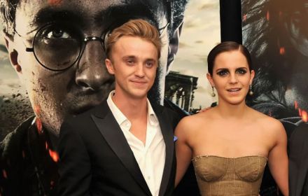 Een foto van Tom Felton en Emma Watson.